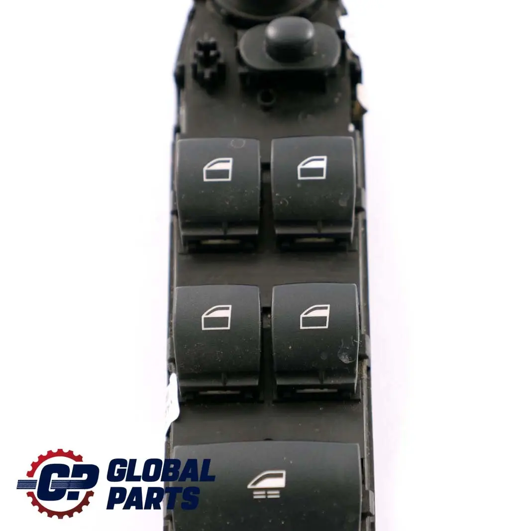Panel Interruptor Elevalunas Lado Conductor Negro para BMW E88 con número de pieza 9167181 BMW E88 Panel Interruptor Elevalunas Lado Conductor Negro - SKU 9167181-1 - Número de pieza 9167181