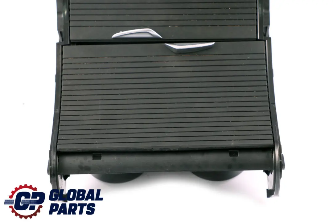 Console Centrale Rullo Portabevande Nero per BMW X1 X2 F39 F48 con numero di parte 9292557 BMW X1 X2 F39 F48 Console Centrale Rullo Portabevande Nero - SKU 9292557 - Numero di parte 9292557