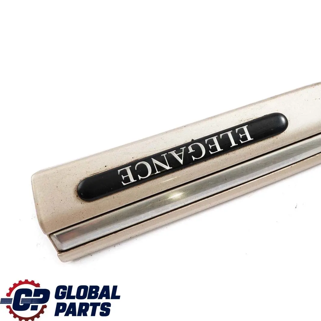 Mercedes-Benz C W203 Front Left Fender Trim Molding Strip Travertine Beige 693 to with Part number A2036904762 Mercedes-Benz C W203 Front Left Fender Trim Molding Strip Travertine Beige 693 - SKU A2036904762-TRB - Part number A2036904762