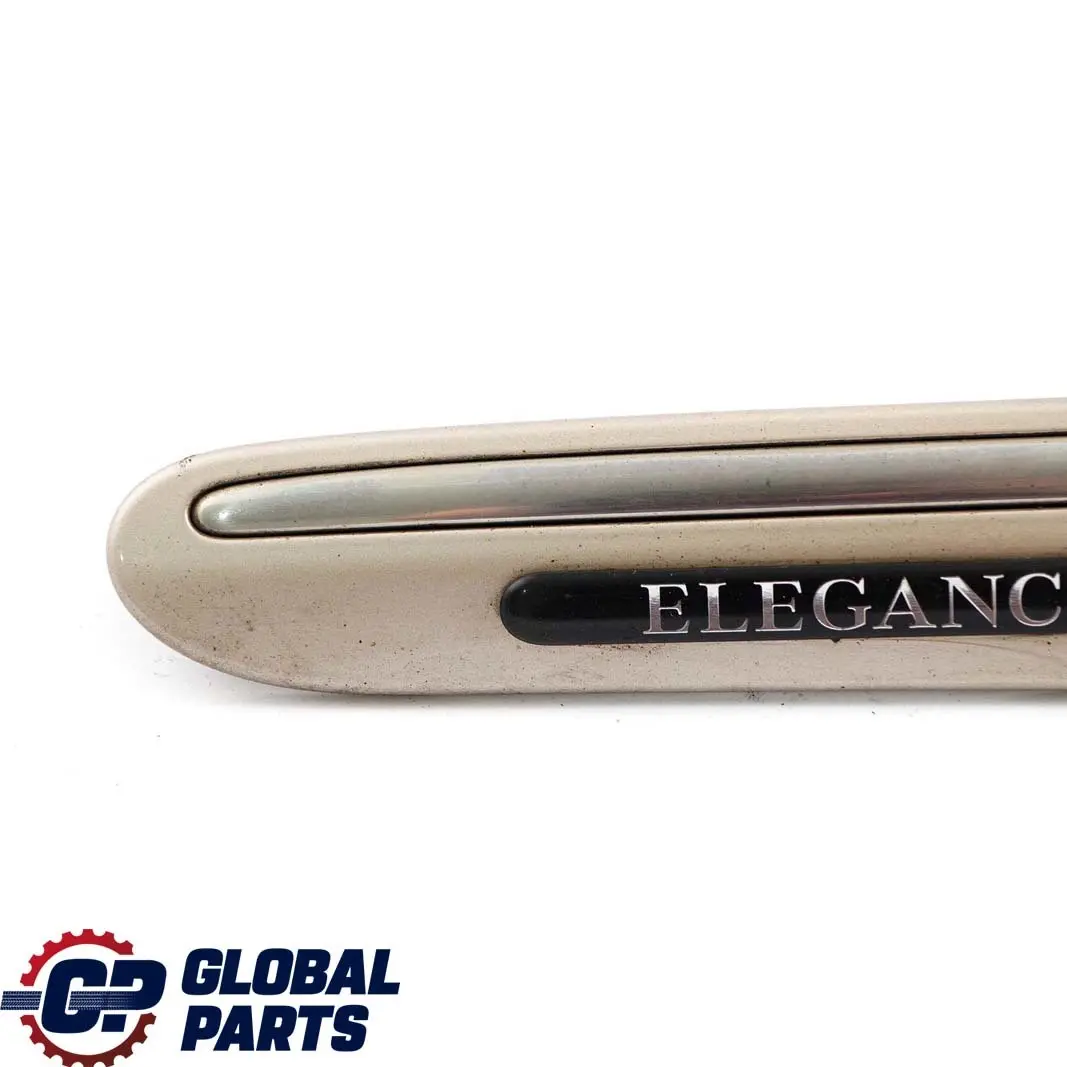 Mercedes-Benz C W203 Front Left Fender Trim Molding Strip Travertine Beige 693 to with Part number A2036904762 Mercedes-Benz C W203 Front Left Fender Trim Molding Strip Travertine Beige 693 - SKU A2036904762-TRB - Part number A2036904762