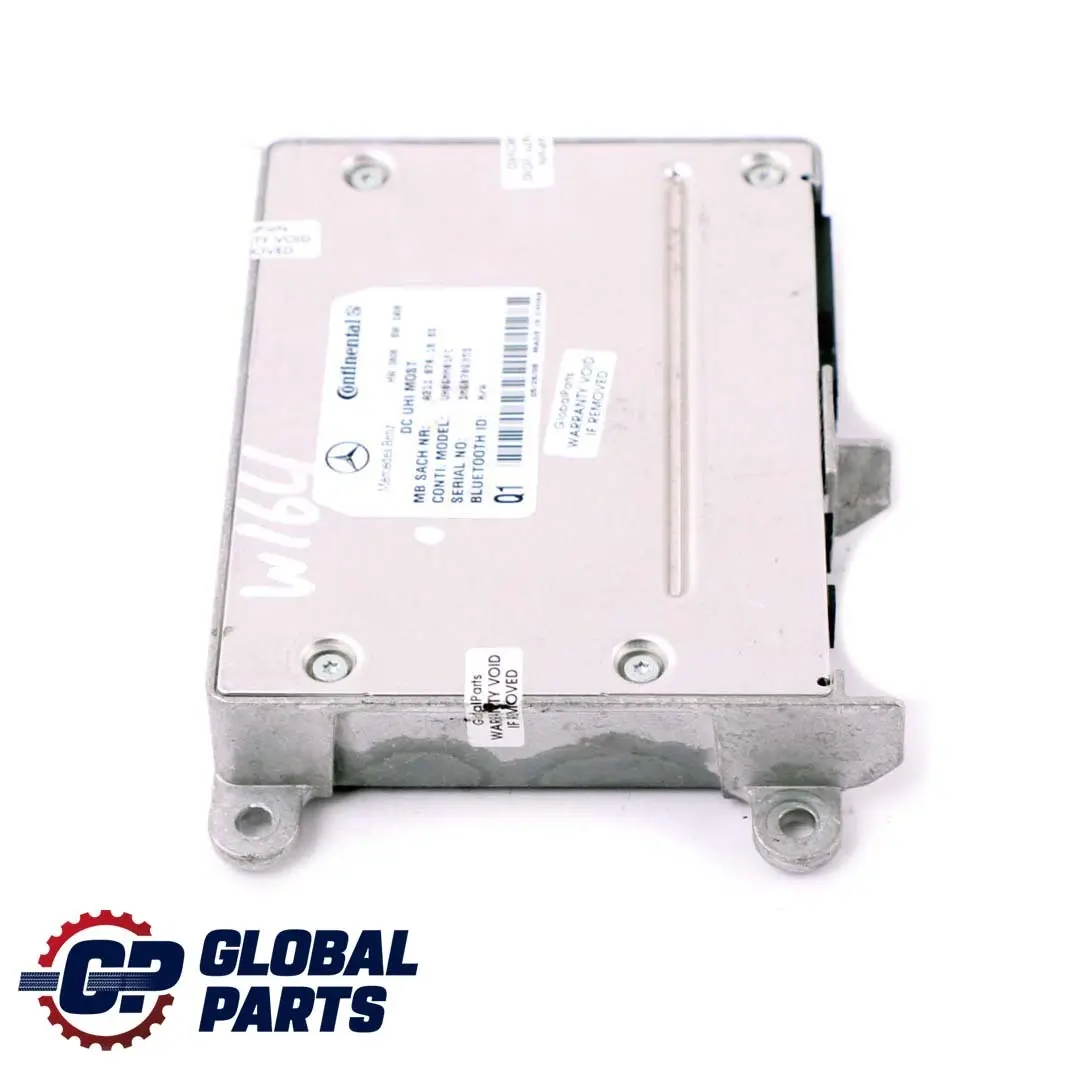 Steuer Gerät Modul DC UHI MOST für Mercedes ML W164 mit Teilenummer A2118701885 Mercedes ML W164 Steuer Gerät Modul DC UHI MOST - SKU A2118701885 - Teilenummer A2118701885