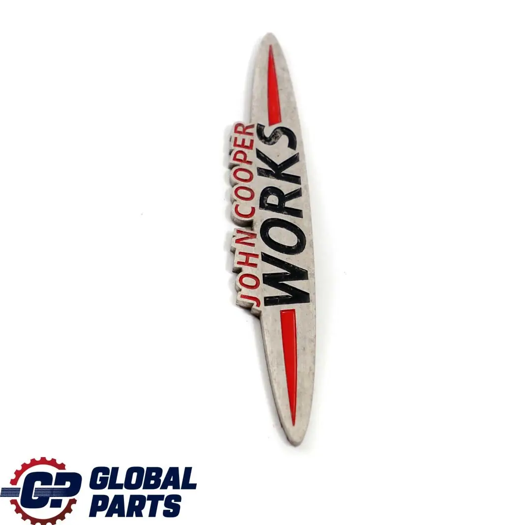 Emblem Logo Marke Plakette für Mini Cooper S JCW John Cooper Works mit Teilenummer JCW Emblem Mini Cooper S JCW John Cooper Works Emblem Logo Marke Plakette - SKU JCW-Emblem - Teilenummer JCW Emblem