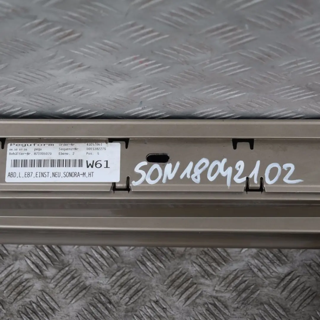 Listello Portiera Apertura Gonna SX Sonora Metallizzato A23 per BMW E87 con numero di parte 51770032949 BMW E87 Listello Portiera Apertura Gonna SX Sonora Metallizzato A23 - SKU 0032949-SON1 - Numero di parte 51770032949