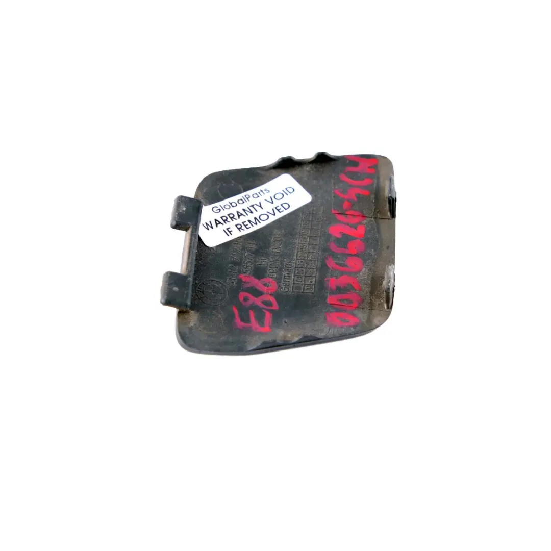 Bumper Flap BMW E82 E88 Towing Eye Cover Schwarz 2 Black 668 to Rear with Part number 0036626 Rear Bumper Flap BMW E82 E88 Towing Eye Cover Schwarz 2 Black 668 - SKU 0036626-SCH - Part number 0036626