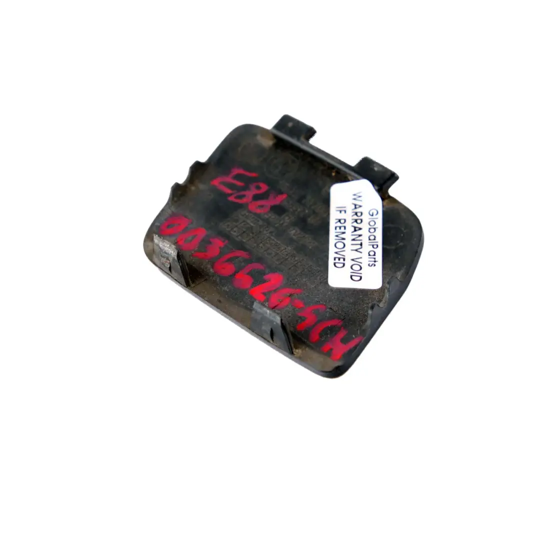 Bumper Flap BMW E82 E88 Towing Eye Cover Schwarz 2 Black 668 to Rear with Part number 0036626 Rear Bumper Flap BMW E82 E88 Towing Eye Cover Schwarz 2 Black 668 - SKU 0036626-SCH - Part number 0036626