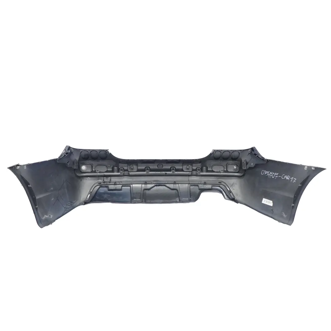 Zderzak Tylny M-Pakiet PDC Carbonschwarz Czarny Metalik - 416 do BMW E60 o numerze 0394707 BMW E60 Zderzak Tylny M-Pakiet PDC Carbonschwarz Czarny Metalik - 416 - SKU 0394707-CAR17 - Numer Części 0394707