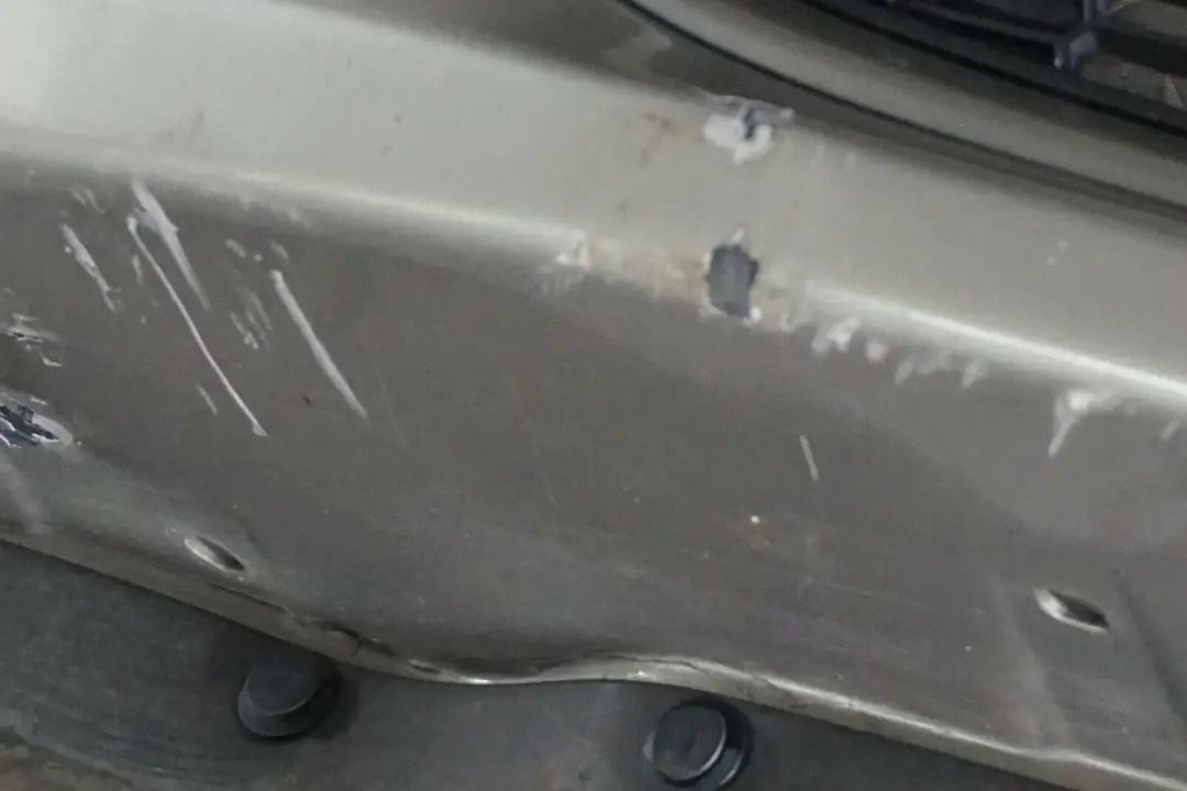 Complete Front Bumper Trim Panel Sparkling Silver to BMW Mini Cooper S R55 R56 R57 with Part number 0430242 BMW Mini Cooper S R55 R56 R57 Complete Front Bumper Trim Panel Sparkling Silver - SKU 0430242-SS - Part number 0430242