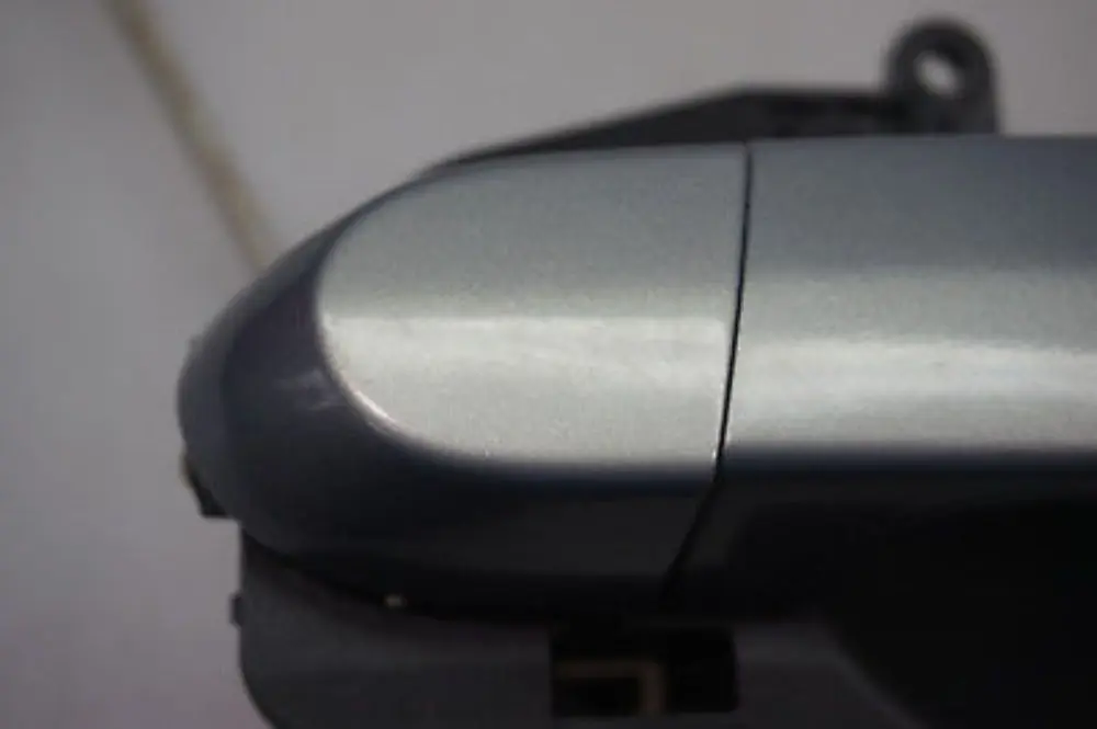 Klamka z mocowaniem lewa tylna tył do BMW E90 o numerze 445183 BMW E90 Klamka z mocowaniem lewa tylna tył - SKU 0445183-AM - Numer Części 445183