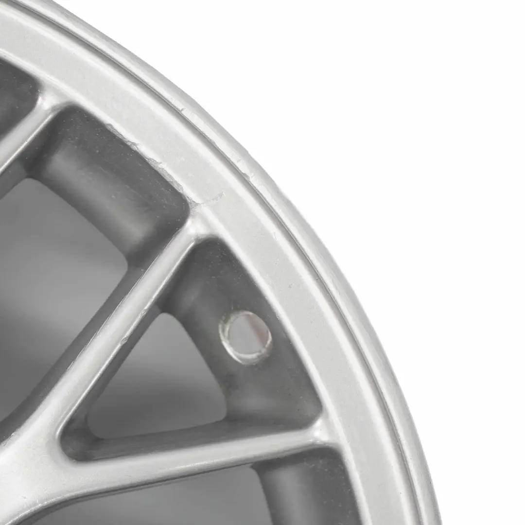 Cerchio in lega argento 16" a raggi incrociati 42 7J ET:46 per BMW E36 E46 con numero di parte 1095058 BMW E36 E46 Cerchio in lega argento 16" a raggi incrociati 42 7J ET:46 - SKU 1095058-2 - Numero di parte 1095058