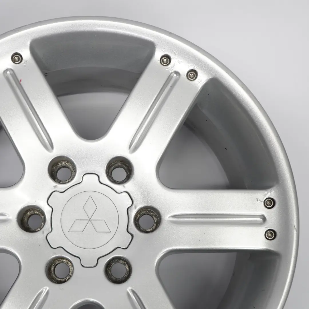 Srebrna Felga Aluminiowa 18" ET:46 8.5J do Mitsubishi Shogun Pajero o numerze 16388546Z2 Mitsubishi Shogun Pajero Srebrna Felga Aluminiowa 18" ET:46 8.5J - SKU 16388546Z2 - Numer Części 16388546Z2