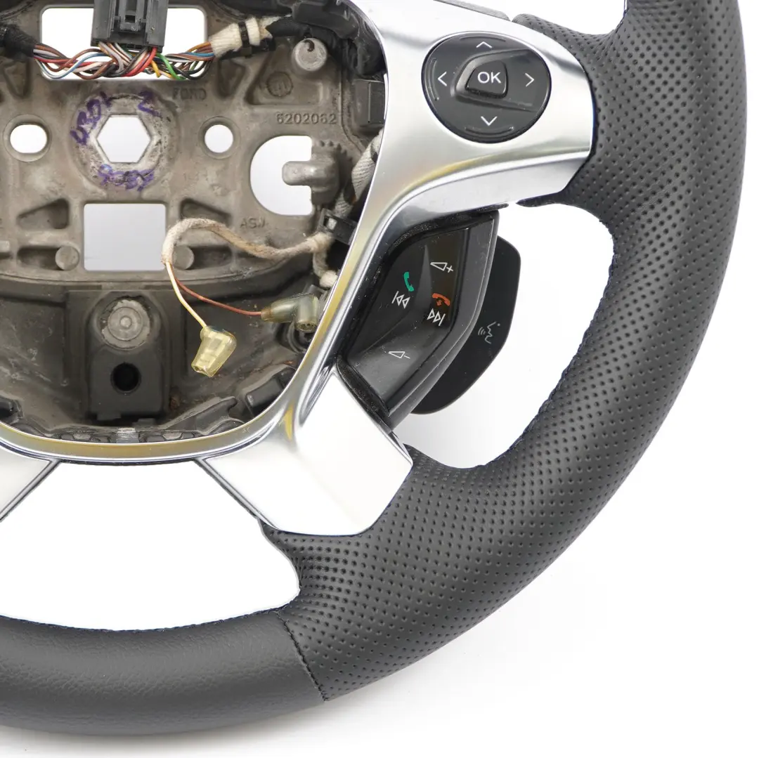 NUOVO Volante in pelle nera multifunzione DK21-3600-DD per Ford Transit Custom con numero di parte 1812830 Ford Transit Custom NUOVO Volante in pelle nera multifunzione DK21-3600-DD - SKU 1812830-1 - Numero di parte 1812830