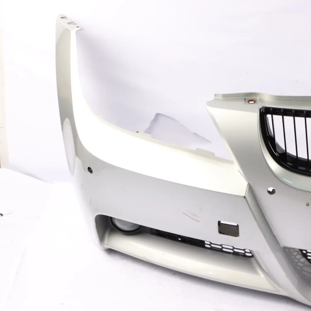 Front Bumper Trim Panel Complete Titan Silver Metallic - 354 to BMW E90 E91 with Part number 0033169 BMW E90 E91 Front Bumper Trim Panel Complete Titan Silver Metallic - 354 - SKU 0033169-TS - Part number 0033169