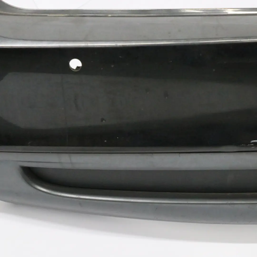 Zderzak Tylny Tył M-Pakiet Black Sapphire Czarny Metalik - 475 do BMW E82 E88 o numerze 0036311 BMW E82 E88 Zderzak Tylny Tył M-Pakiet Black Sapphire Czarny Metalik - 475 - SKU 0036311-BS1 - Numer Części 0036311