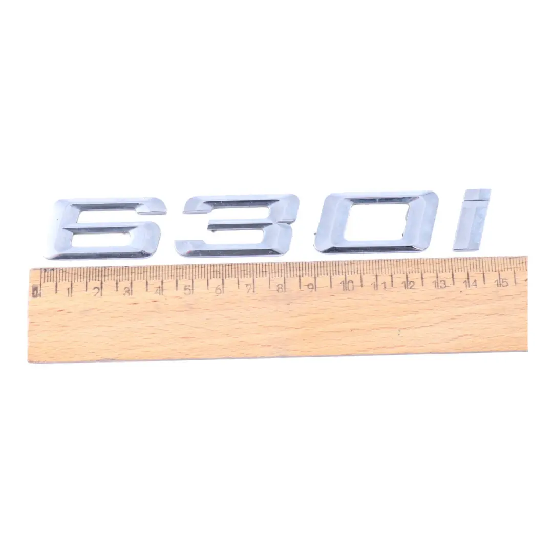 Emblem BMW E63 E64 Petrol N52 Trunk Lid Rear Lettering 630i Logo to with Part number 7163792 Emblem BMW E63 E64 Petrol N52 Trunk Lid Rear Lettering 630i Logo - SKU 7163792 - Part number 7163792