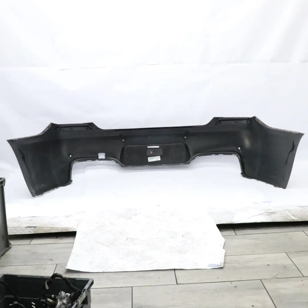 Bumper BMW F12 F13 M Sport Bumper Panel Trim PDC Black Sapphire - 475 to Rear with Part number 8052709 Rear Bumper BMW F12 F13 M Sport Bumper Panel Trim PDC Black Sapphire - 475 - SKU 8052709-BS - Part number 8052709