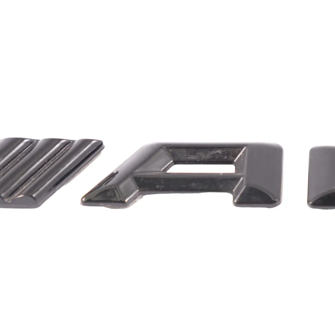 Kofferraum Emblem hinten aufgeklebt Schwarz für Mercedes CLA C117 AMG mit Teilenummer A1178170014 Mercedes CLA C117 AMG Kofferraum Emblem hinten aufgeklebt Schwarz - SKU A1178170014 - Teilenummer A1178170014
