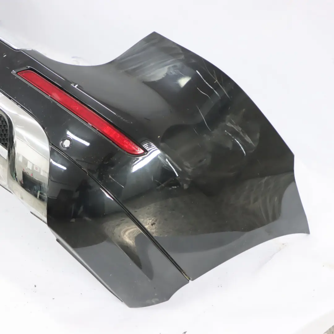 Bumper Rear Trim Panel Covering AMG Obsidian Black Metallic - 197 to Mercedes W166 with Part number A1668804440 Mercedes W166 Bumper Rear Trim Panel Covering AMG Obsidian Black Metallic - 197 - SKU A1668804440-OB - Part number A1668804440