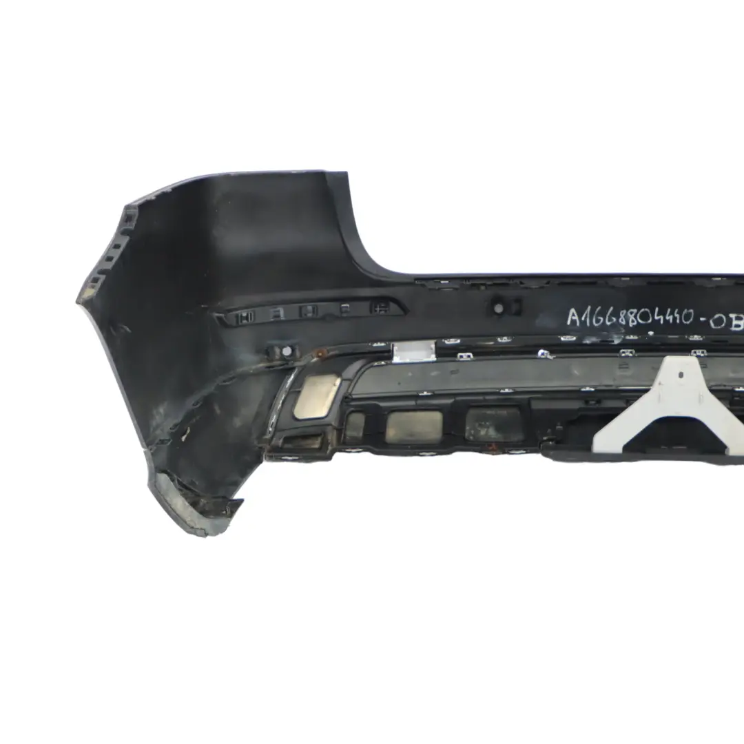 Bumper Rear Trim Panel Covering AMG Obsidian Black Metallic - 197 to Mercedes W166 with Part number A1668804440 Mercedes W166 Bumper Rear Trim Panel Covering AMG Obsidian Black Metallic - 197 - SKU A1668804440-OB - Part number A1668804440