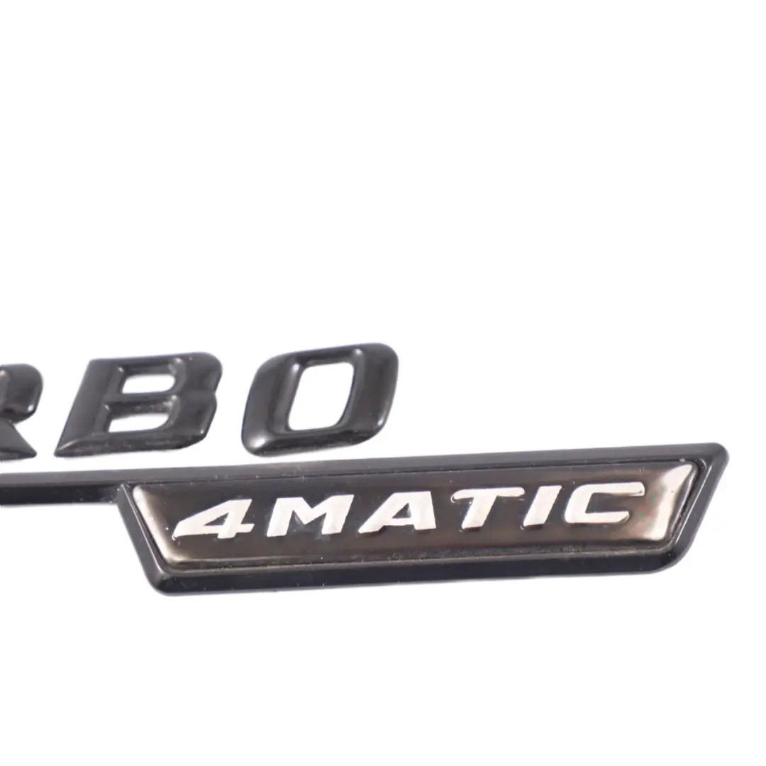 Emblemat Logo Znaczek Błotnika Lewe Turbo 4Matic do Mercedes C117 W176 o numerze A1768170315 Mercedes C117 W176 Emblemat Logo Znaczek Błotnika Lewe Turbo 4Matic - SKU A1768170315 - Numer Części A1768170315
