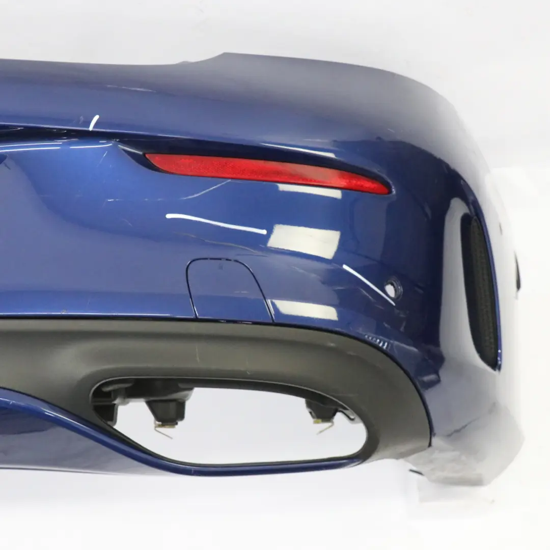 Bumper Rear Trim Panel Covering AMG Brilliant Blue Metallic - 896 to Mercedes C205 with Part number A2058808803 Mercedes C205 Bumper Rear Trim Panel Covering AMG Brilliant Blue Metallic - 896 - SKU A2058808803-BRB - Part number A2058808803