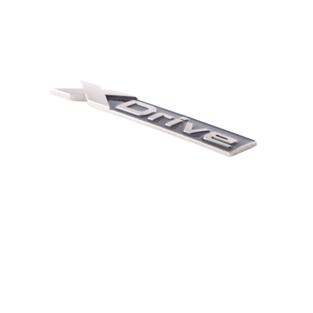 Boot Trunk Lettering Emblem Adhered Badge xDrive to BMW F40 with Part number 8077409 BMW F40 Boot Trunk Lettering Emblem Adhered Badge xDrive - SKU 8077409 - Part number 8077409