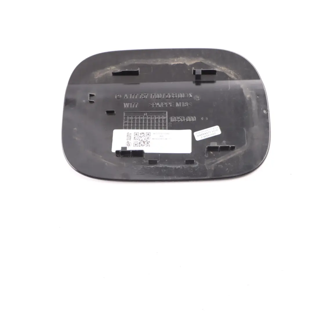 Fill in Flap Cover Cap Cosmic Black Metallic 191 to Mercedes W177 Fuel with Part number A1777571700 Mercedes W177 Fuel Fill in Flap Cover Cap Cosmic Black Metallic 191 - SKU A1777571700-KB - Part number A1777571700