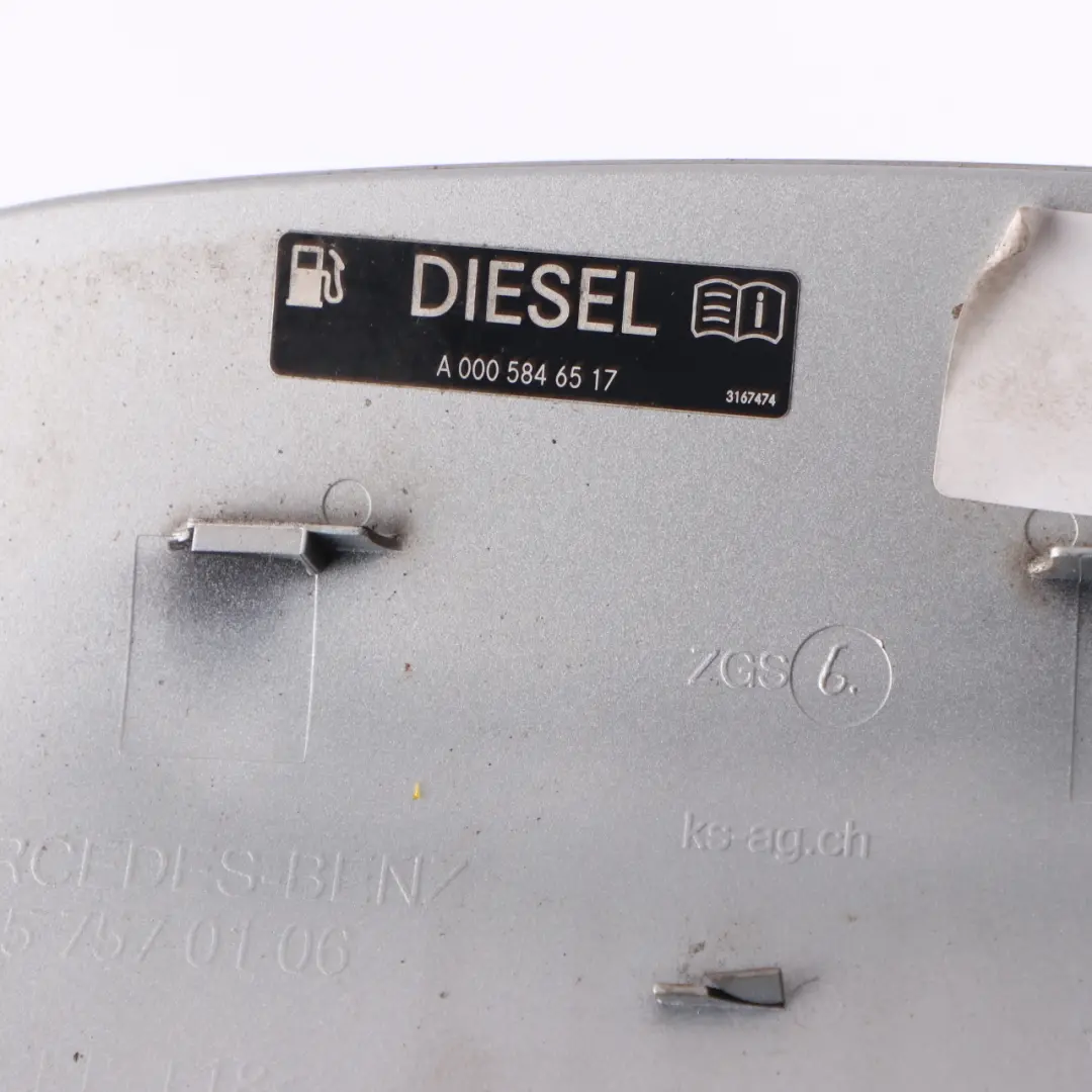 Filler Fill in Flap Cover Cap Iridium Silver 775 to Mercedes W205 Fuel with Part number A2057570106 Mercedes W205 Fuel Filler Fill in Flap Cover Cap Iridium Silver 775 - SKU A2057570106-IRS - Part number A2057570106