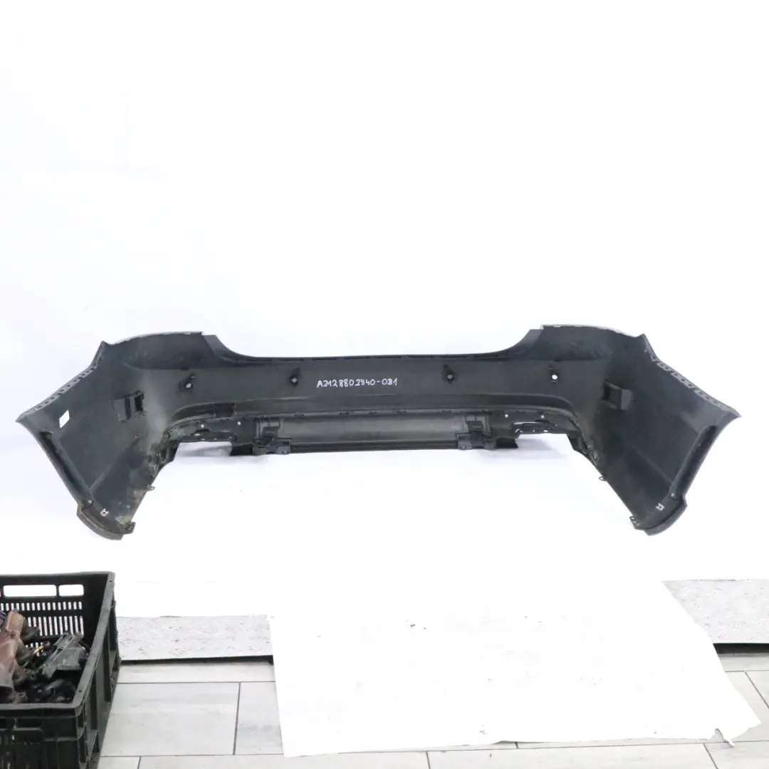 Bumper AMG Saloon Trim Panel Cover Obsidian Black - 197 to Mercedes W212 Rear with Part number A2128802940 Mercedes W212 Rear Bumper AMG Saloon Trim Panel Cover Obsidian Black - 197 - SKU A2128802940-OB1 - Part number A2128802940