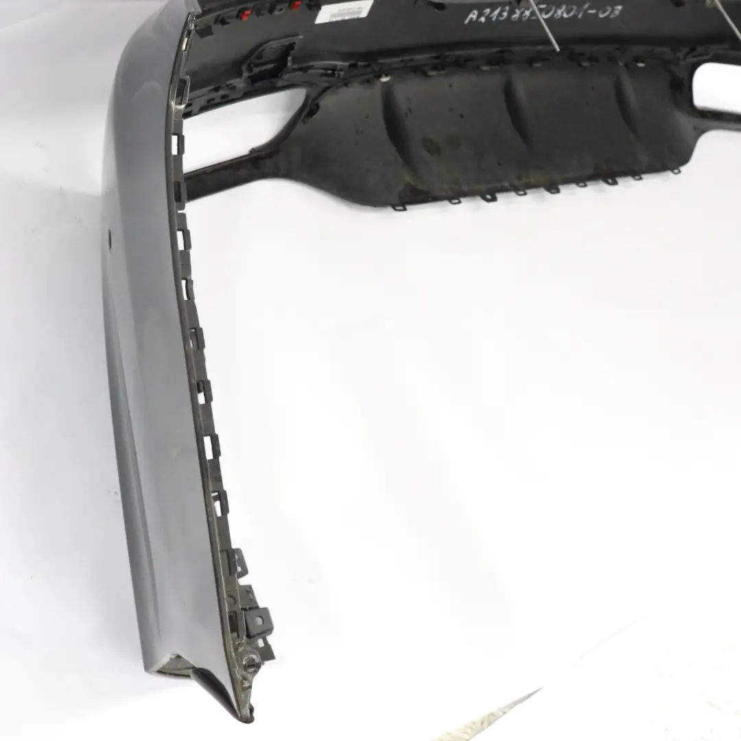 Bumper AMG Trim Panel Covering Obsidian Black - 197 to Mercedes W213 Rear with Part number A2138850801 Mercedes W213 Rear Bumper AMG Trim Panel Covering Obsidian Black - 197 - SKU A2138850801-OB - Part number A2138850801