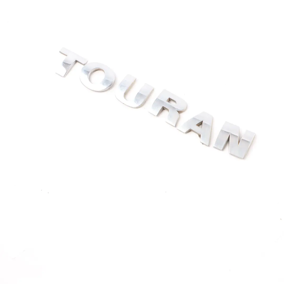Lettering Boot Trunk TOURAN Emblem Badge Lid to Volkswagen Touran 1T with Part number 1T0853687A Volkswagen Touran 1T Lettering Boot Trunk TOURAN Emblem Badge Lid - SKU 1T0853687A - Part number 1T0853687A
