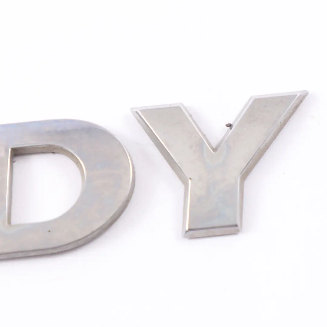 Heck Klappen Emblem Schriftzug Caddy Kofferraum Abzeichen für Volkswagen Caddy Maxi mit Teilenummer 2K5853687 Volkswagen Caddy Maxi Heck Klappen Emblem Schriftzug Caddy Kofferraum Abzeichen - SKU 2K5853687 - Teilenummer 2K5853687