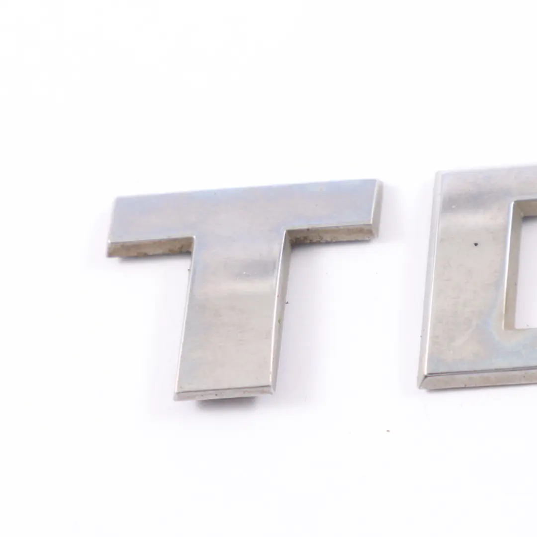 Emblem Lettering Rear TDI Trunk Badge to Volkswagen Caddy Maxi Tailgate with Part number 5K0853675AP Volkswagen Caddy Maxi Tailgate Emblem Lettering Rear TDI Trunk Badge - SKU 5K0853675AP - Part number 5K0853675AP