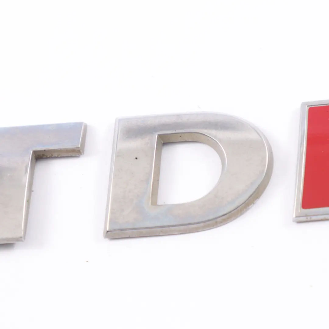 Heck Klappen Emblem Hinten TDI Abzeichen für Volkswagen Caddy Maxi mit Teilenummer 5K0853675AP Volkswagen Caddy Maxi Heck Klappen Emblem Hinten TDI Abzeichen - SKU 5K0853675AP - Teilenummer 5K0853675AP