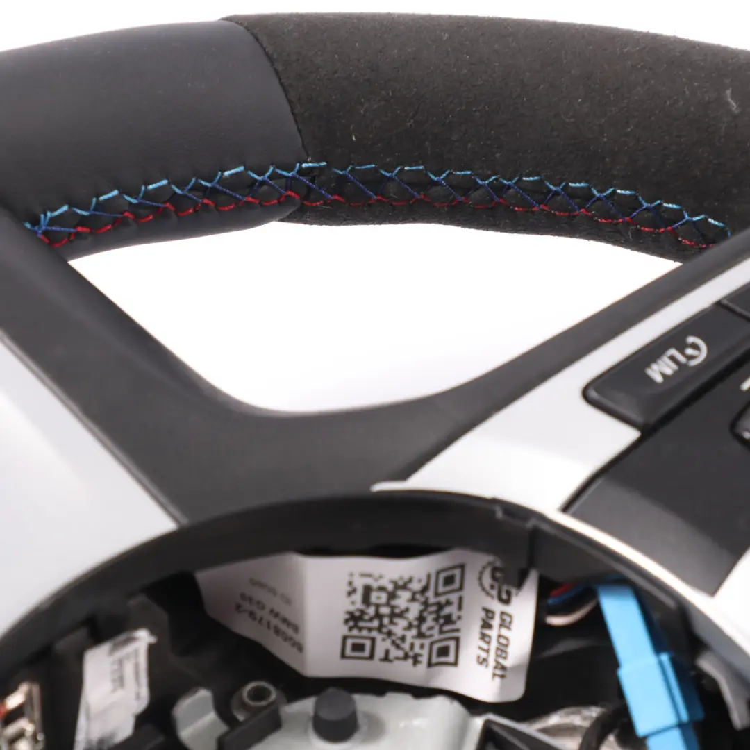 NUOVO in Pelle Nera Alcantara Cambio al Volante per Volante BMW G30 G31 G32 M Sport con numero di parte 8008179 Volante BMW G30 G31 G32 M Sport NUOVO in Pelle Nera Alcantara Cambio al Volante - SKU 8008179-2 - Numero di parte 8008179