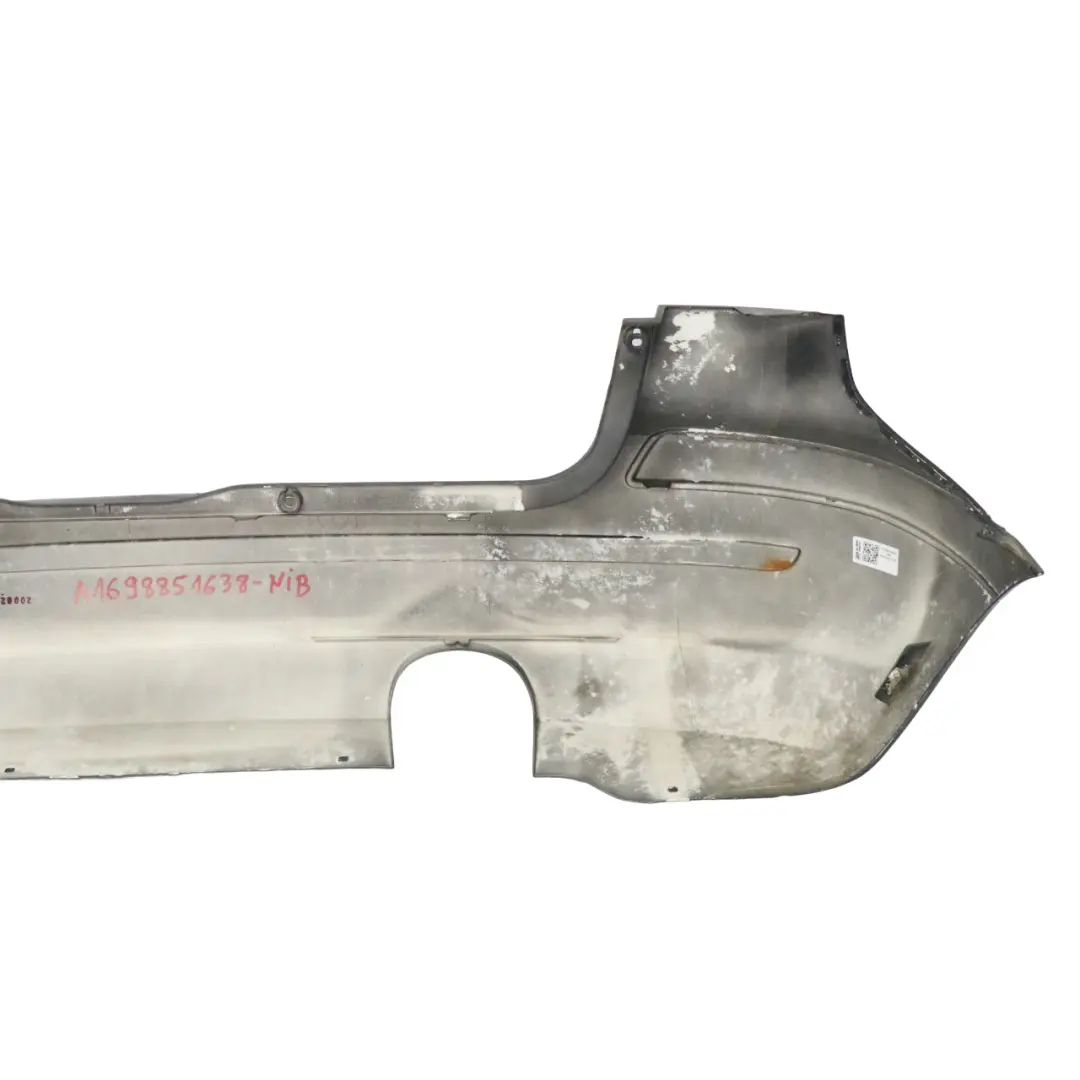 Bumper Trim Panel Night Black Metallic - 696 to Mercedes W245 Rear with Part number A1698851638 Mercedes W245 Rear Bumper Trim Panel Night Black Metallic - 696 - SKU A1698851638-NIB - Part number A1698851638