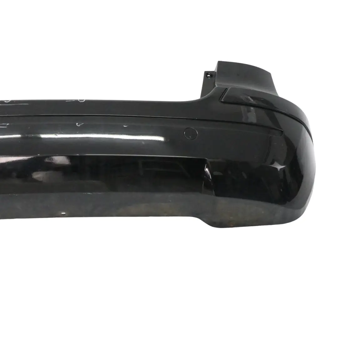Bumper Trim Panel Night Black Metallic - 696 to Mercedes W245 Rear with Part number A1698851638 Mercedes W245 Rear Bumper Trim Panel Night Black Metallic - 696 - SKU A1698851638-NIB - Part number A1698851638