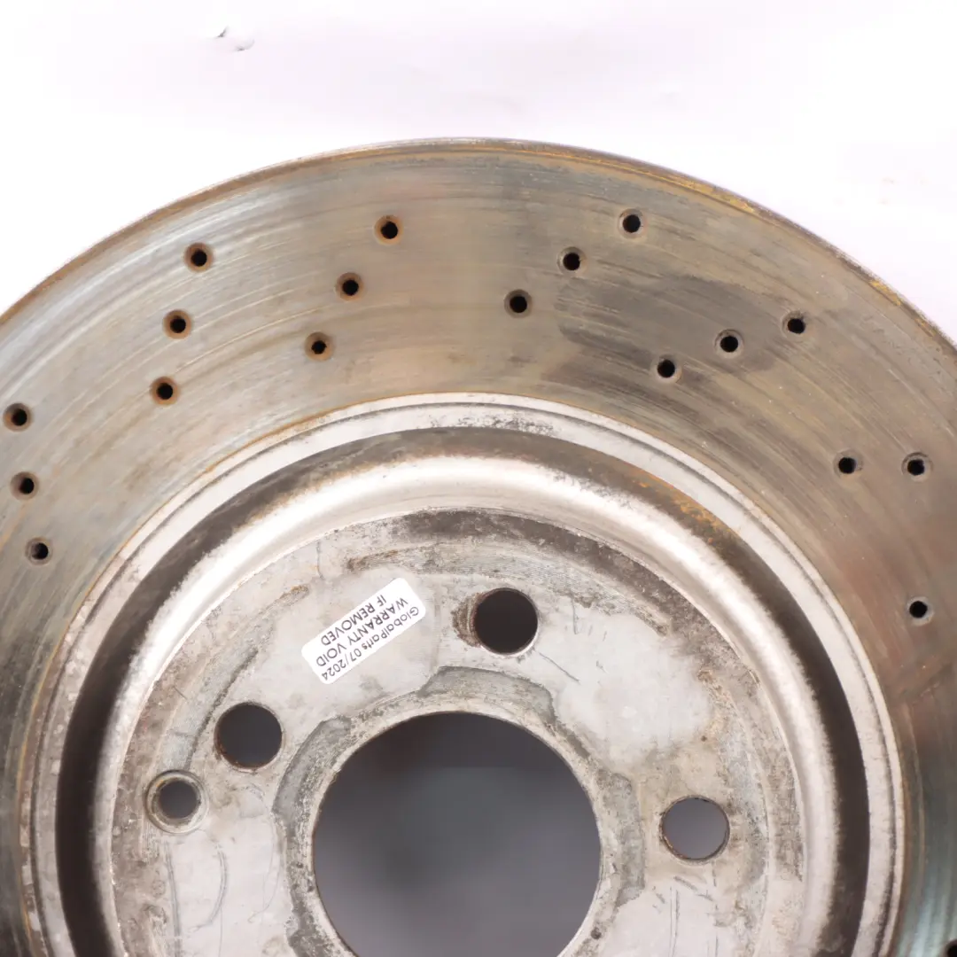 Brake Disc Set Front Left Right Wheel N/O/S Perforated Discs to Mercedes W221 with Part number A2214211712 Mercedes W221 Brake Disc Set Front Left Right Wheel N/O/S Perforated Discs - SKU A2214211712 - Part number A2214211712