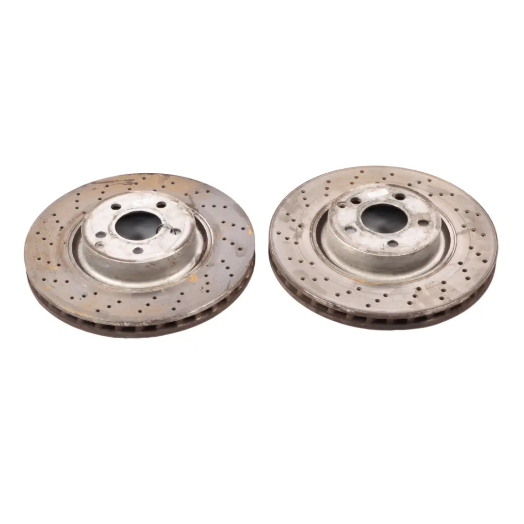 Brake Disc Set Front Left Right Wheel N/O/S Perforated Discs to Mercedes W221 with Part number A2214211712 Mercedes W221 Brake Disc Set Front Left Right Wheel N/O/S Perforated Discs - SKU A2214211712 - Part number A2214211712