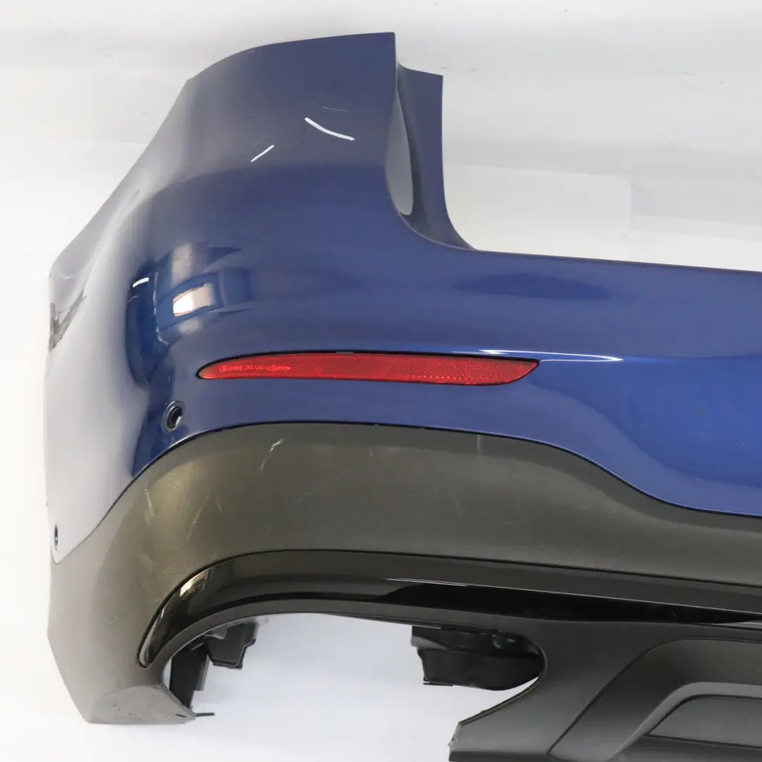 Bumper AMG Trim Panel Covering Brilliant Blue Metallic - 896 to Mercedes X253 Rear with Part number A2538851601 Mercedes X253 Rear Bumper AMG Trim Panel Covering Brilliant Blue Metallic - 896 - SKU A2538851601-BRB - Part number A2538851601
