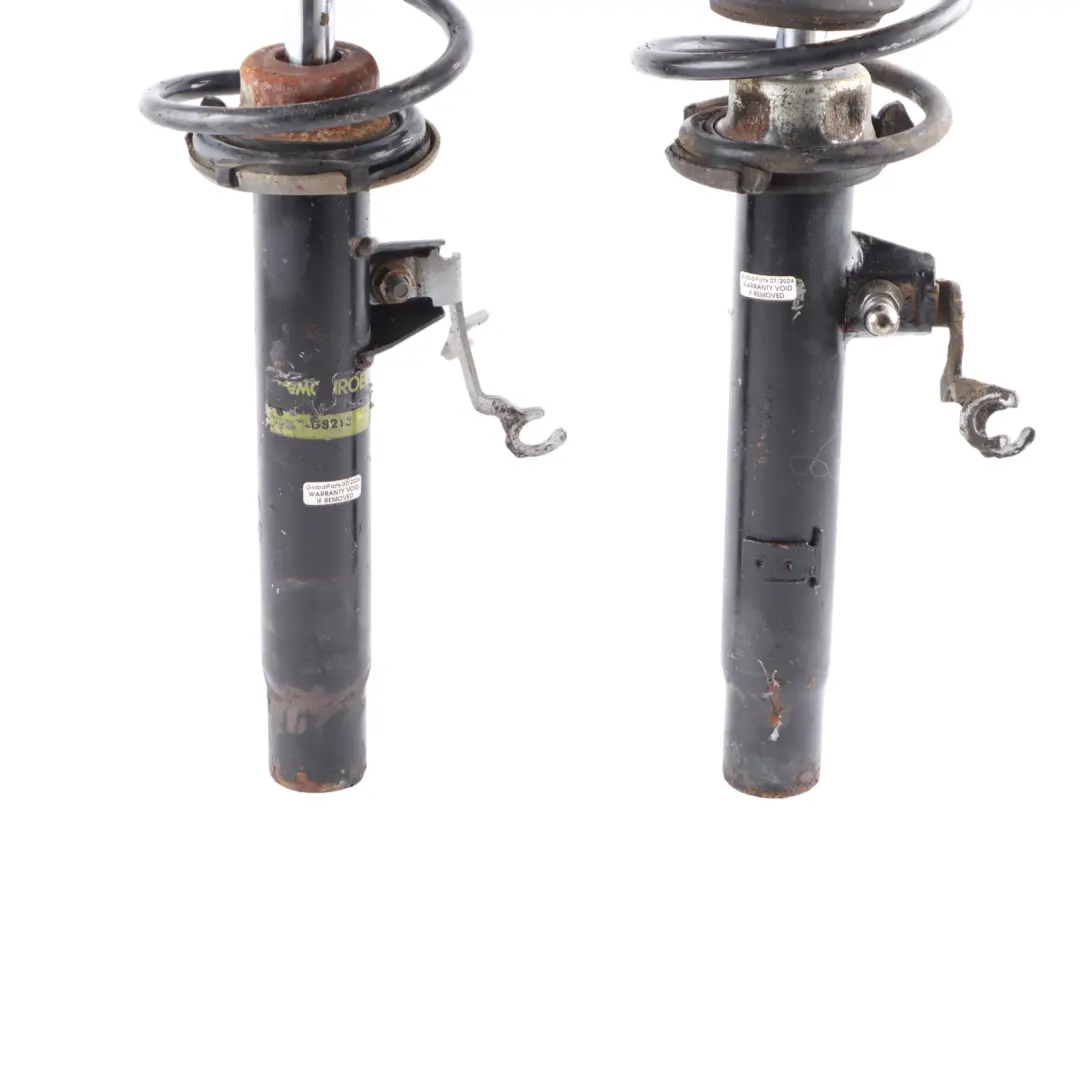 Strut Set BMW E90 E91 E92 Shock Absorber Monroe Front Suspension to Spring with Part number G8213 Spring Strut Set BMW E90 E91 E92 Shock Absorber Monroe Front Suspension - SKU G8213 - Part number G8213