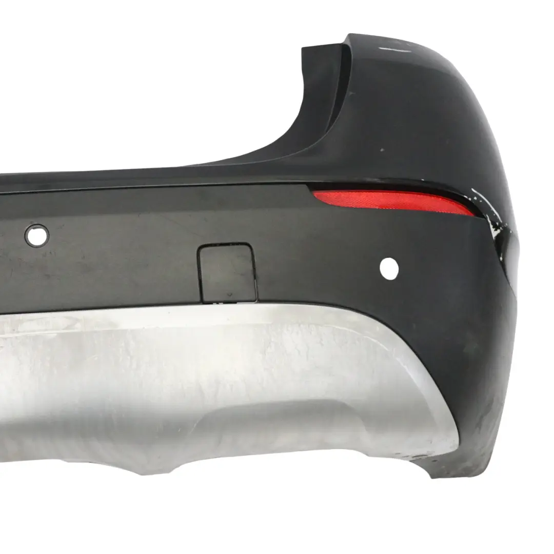 Complete Rear Bumper Trim Panel PDC Black Sapphire Metallic - 475 to BMW X1 E84 with Part number 2993568 BMW X1 E84 Complete Rear Bumper Trim Panel PDC Black Sapphire Metallic - 475 - SKU 2993568-BS - Part number 2993568