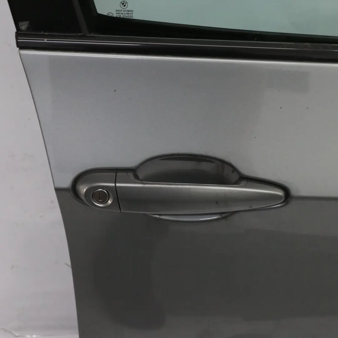 Porta anteriore destra Spacegrau Grigio Spazio Metallizzato - A52 per BMW X5 E70 con numero di parte 7211424 BMW X5 E70 Porta anteriore destra Spacegrau Grigio Spazio Metallizzato - A52 - SKU 7211424-SCG - Numero di parte 7211424