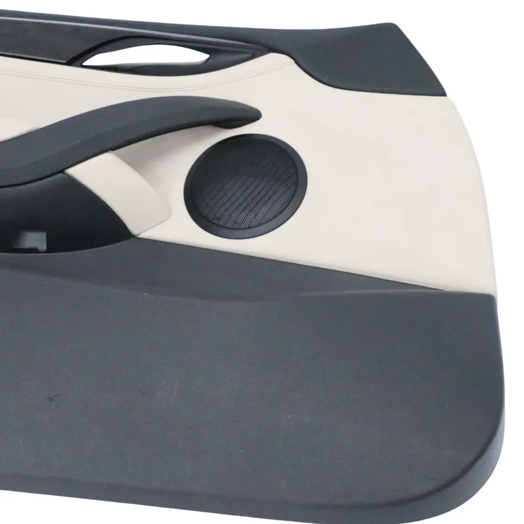 Embellecedor Forro Puerta Delantera Izquierda Cuero Nevada Oyster para BMW E84 con número de pieza 7327195 BMW E84 Embellecedor Forro Puerta Delantera Izquierda Cuero Nevada Oyster - SKU 7327195-1 - Número de pieza 7327195