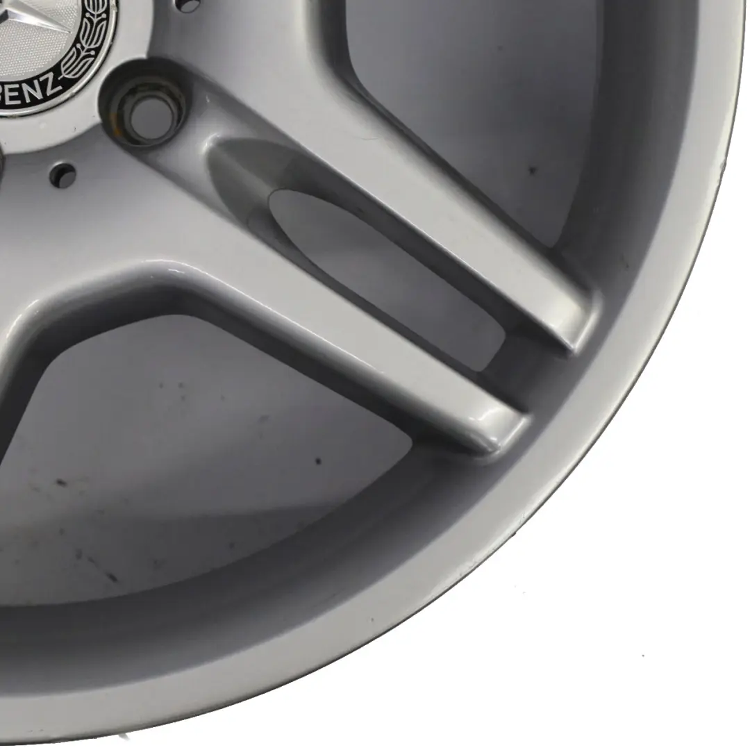 Cerchio in lega argento 18" 8J ET:30 5 fori per Mercedes W211 AMG con numero di parte A2114012602 Mercedes W211 AMG Cerchio in lega argento 18" 8J ET:30 5 fori - SKU A2114012602-1 - Numero di parte A2114012602