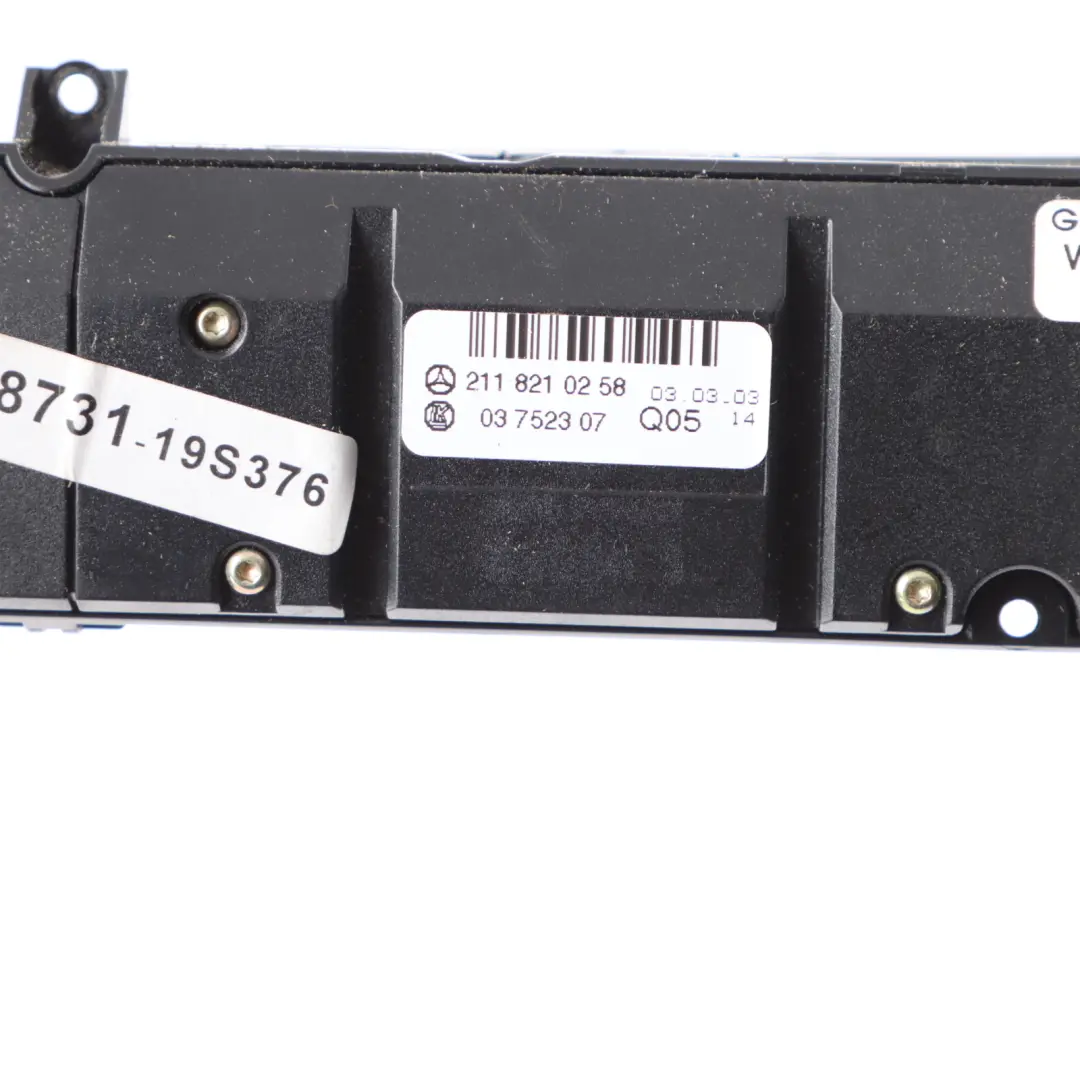 Console Switch Panel ESP Hazard Heated Seat Roller to Mercedes W211 with Part number A2118210258 Mercedes W211 Console Switch Panel ESP Hazard Heated Seat Roller - SKU A2118210258 - Part number A2118210258