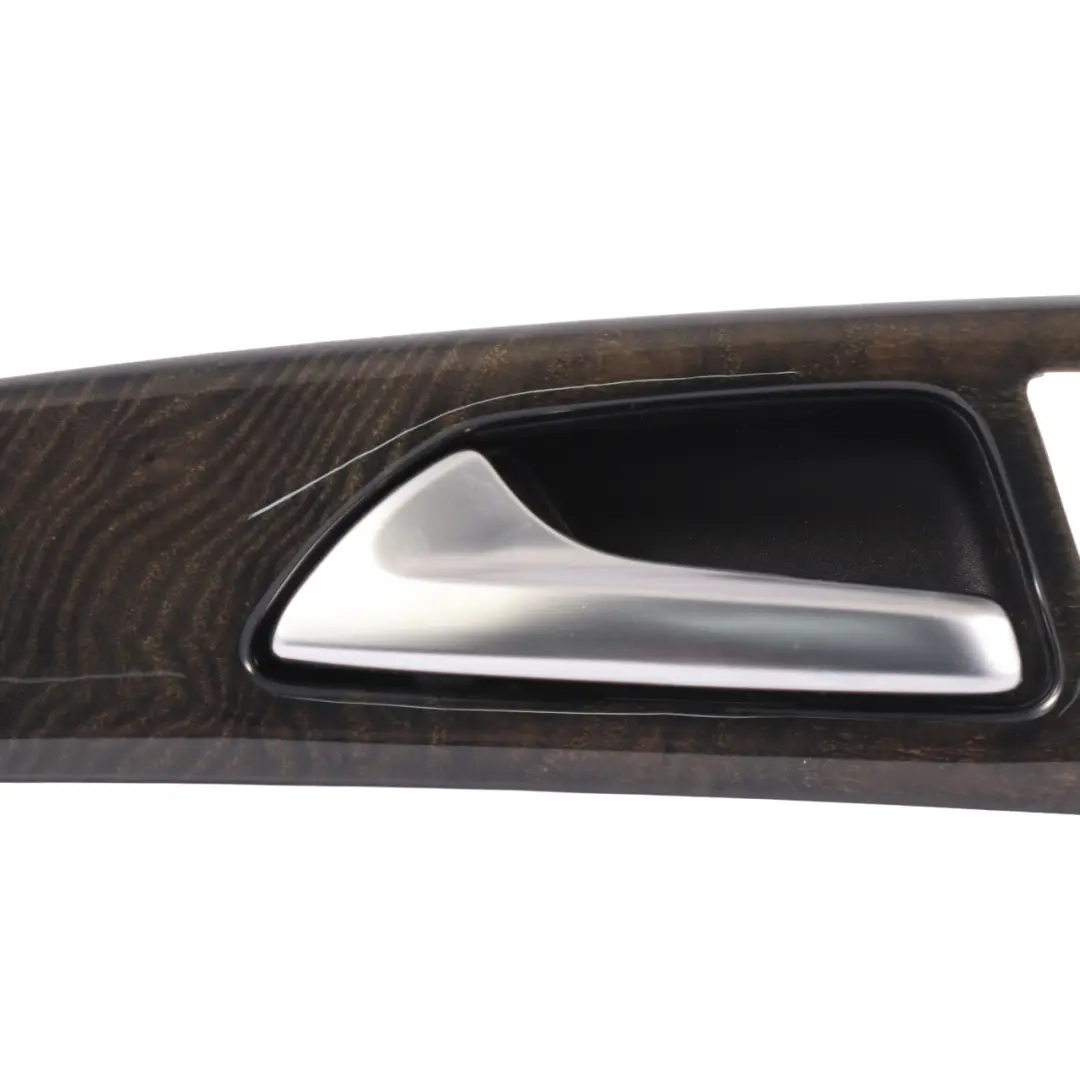 manija puerta interior delantera izquierda Negro Madera Fresno para Mercedes X218 con número de pieza A2187205780 Mercedes X218 manija puerta interior delantera izquierda Negro Madera Fresno - SKU A2187205780 - Número de pieza A2187205780