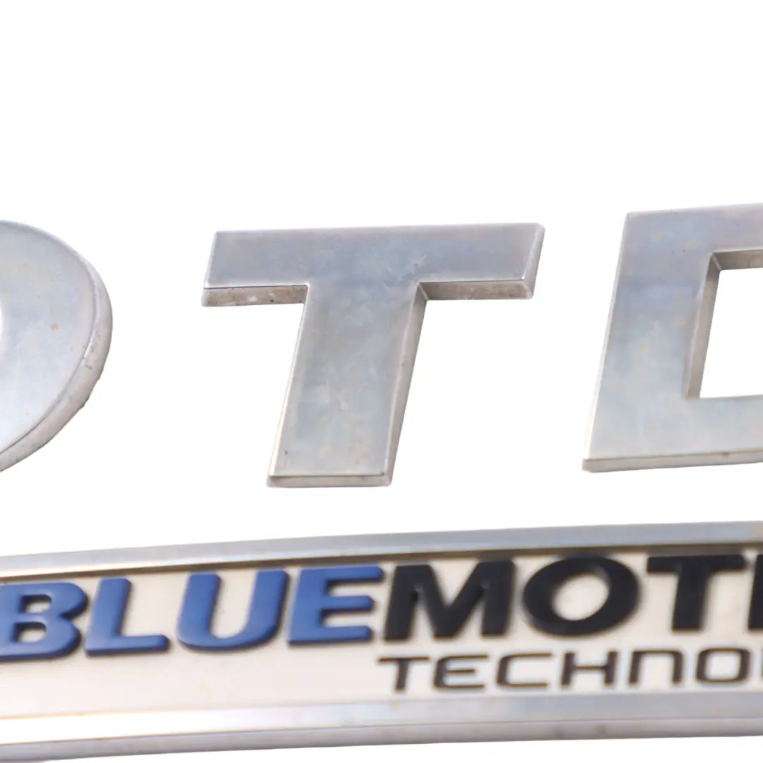 VW Sharan 7N Znaczek Emblemat 2.0TDI Blue Motion Klapy Bagażnika - SKU 1K9853675E - Numer Części 1K9853675E