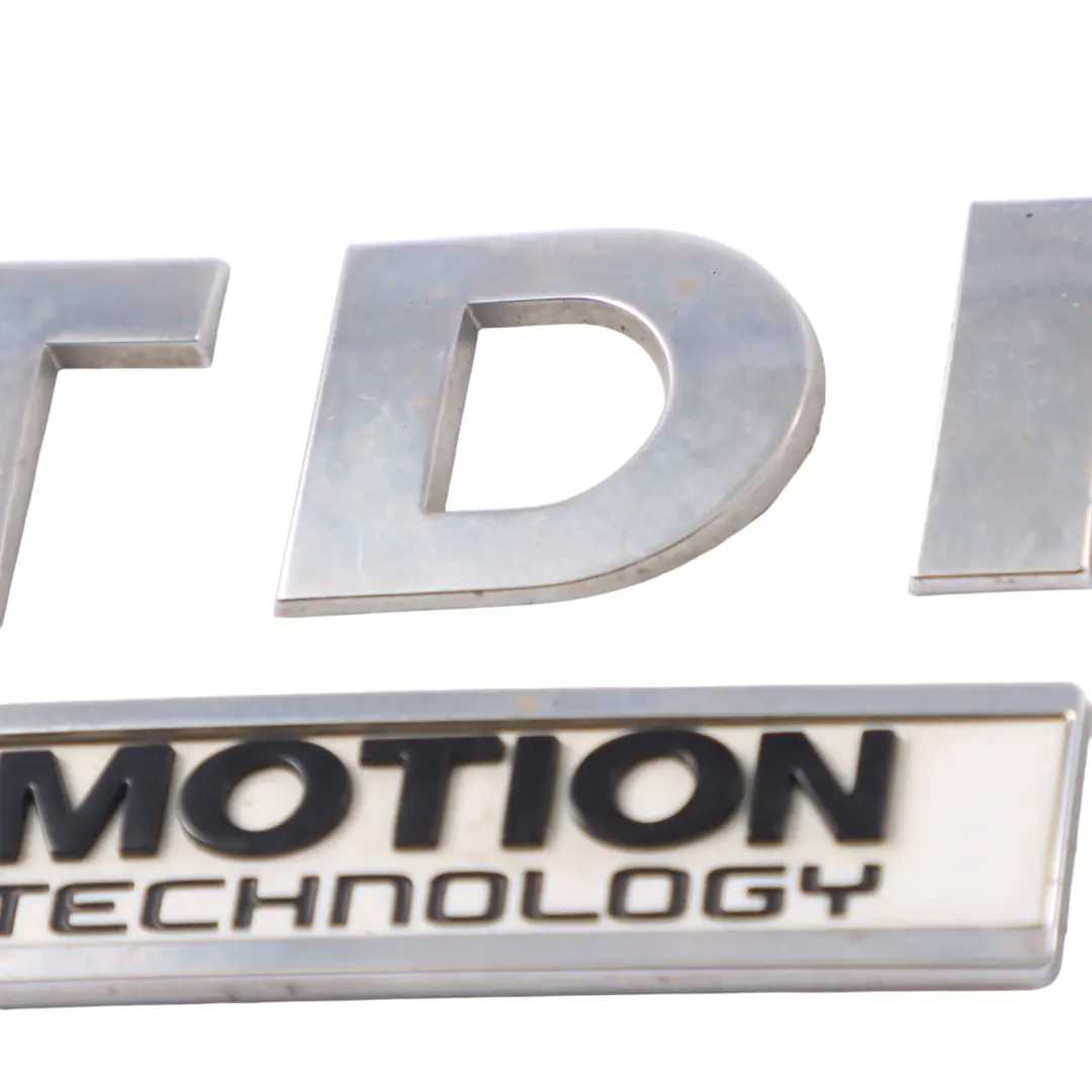 VW Sharan 7N 2.0 TDI Blau Motion Emblem Hintere Kofferraum Klappe - SKU 1K9853675E - Teilenummer 1K9853675E