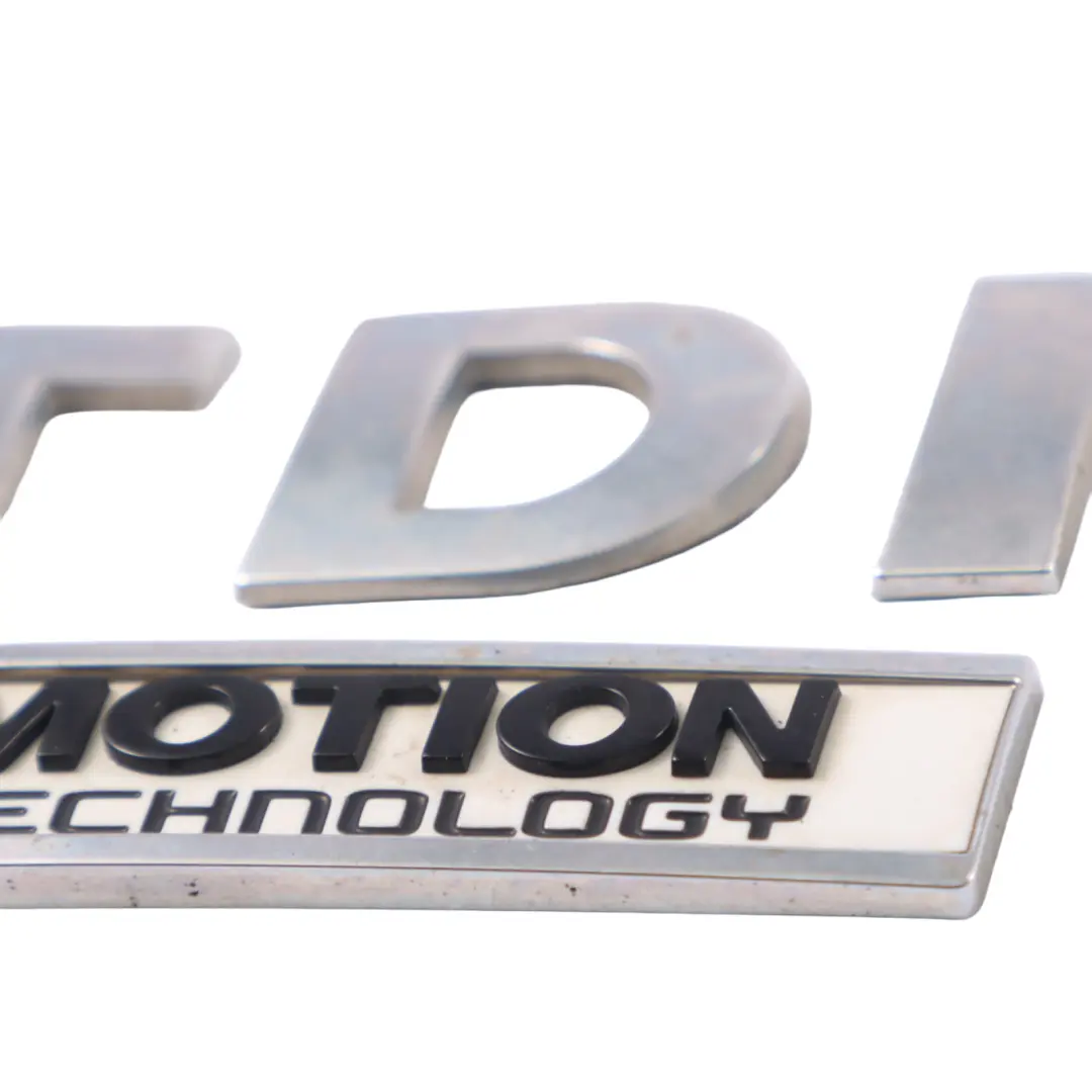 VW Sharan 7N 2.0 TDI Blau Motion Emblem Hintere Kofferraum Klappe - SKU 1K9853675E - Teilenummer 1K9853675E