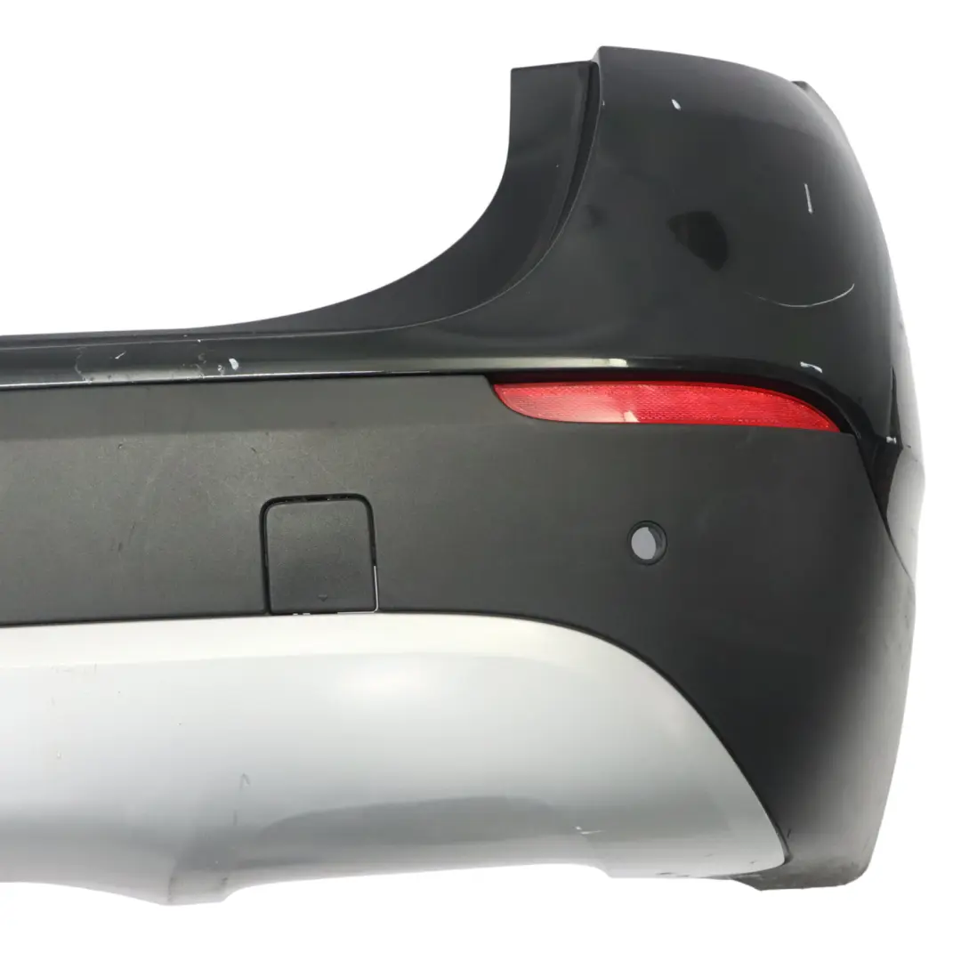 Zderzak Tylny PDC Black Sapphire Czarny Metalik - 475 do BMW X1 E84 o numerze 2993568 BMW X1 E84 Zderzak Tylny PDC Black Sapphire Czarny Metalik - 475 - SKU 2993568-BS1 - Numer Części 2993568